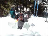 Worker prepares snowpack-sampling pit at Berthoud Pass, Colo.