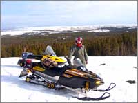 Workers access site at Divide Peak, Wyo. via snowmobile (2)