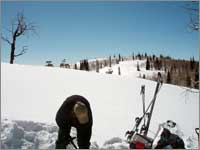 Worker prepares snowpit at Dry Lake, Colo.