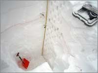 Snowpack-sampling pit near Dunckley Pass, Colo.