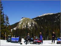 Workers prepare to haul snow samples away from site at Lake Irene, Colo. 