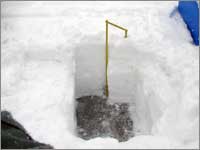 Snowpack-sampling site in snowpacked roadway adjacent to Old Faithful Fire Road, Wyo.